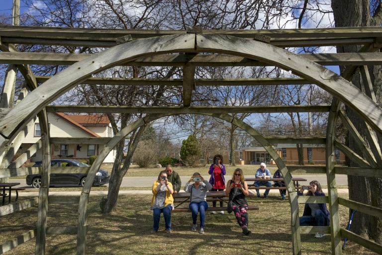 Participants putting their new skills to work on a photo walk.